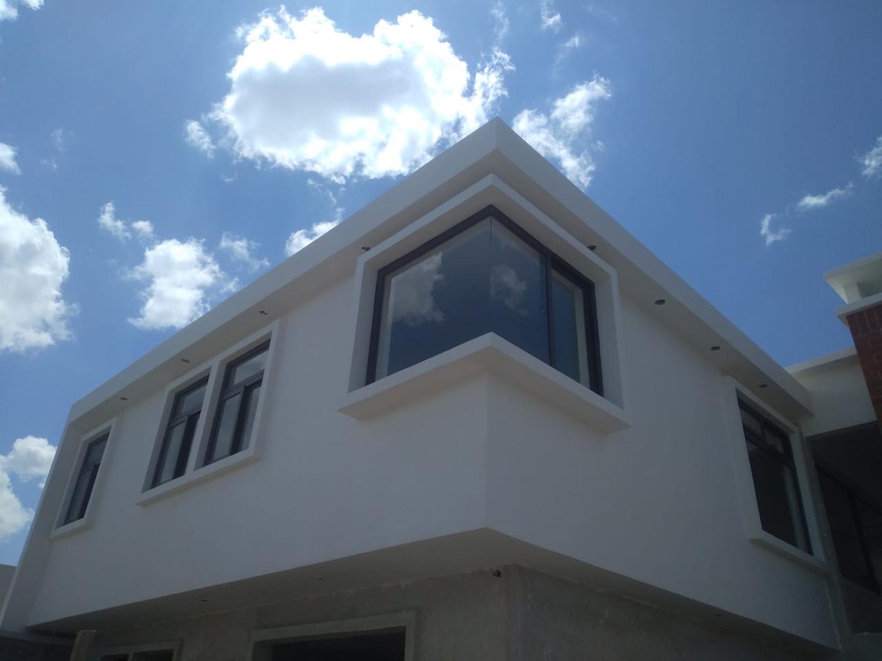 Vivienda La Esperanza - Chimenea doble altura